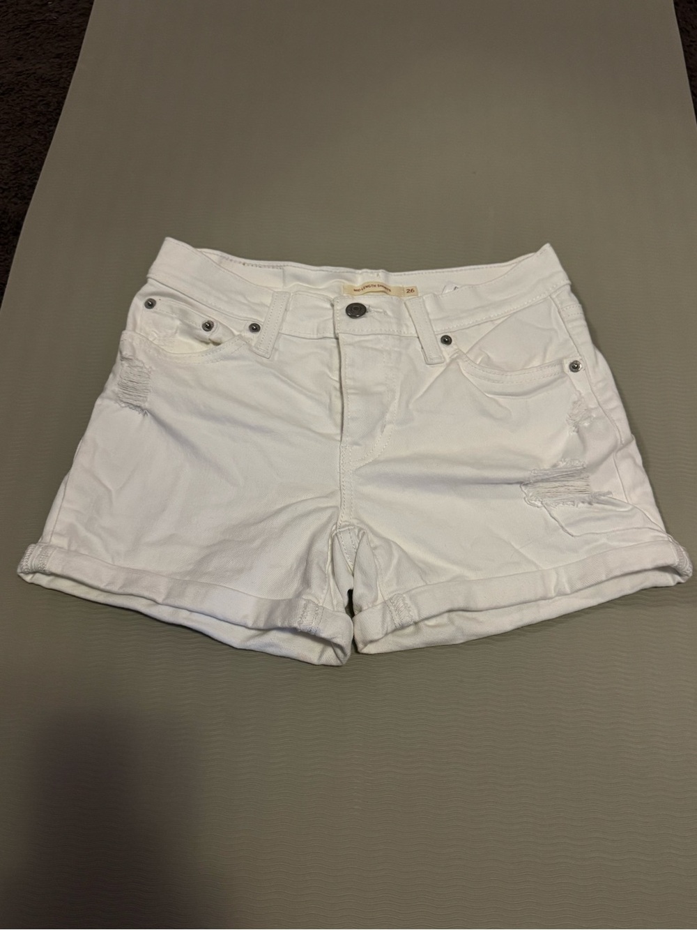 Levi’s White mid length denim shorts size 26